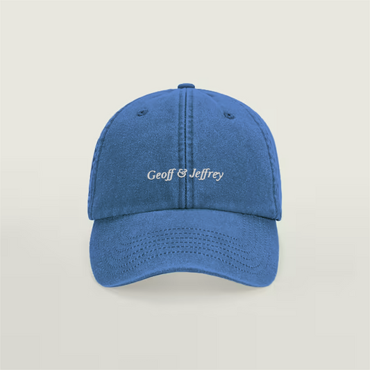 Front view of Geoff & Jeffrey vintage Cornflower blue dad cap with white embroidery