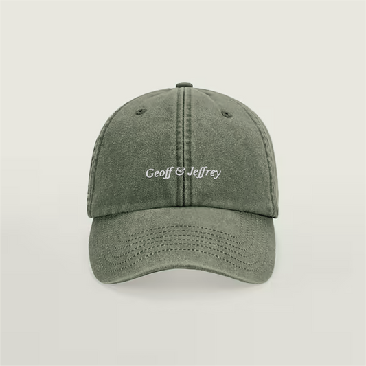 Front view of Geoff & Jeffrey vintage Olive Green dad cap with white embroidery