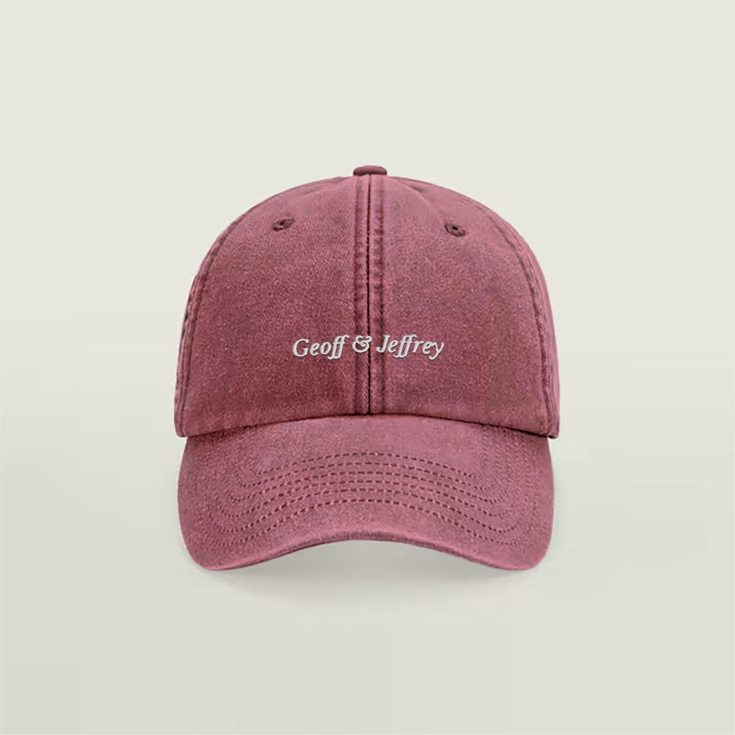 Front view of Geoff & Jeffrey vintage Strawberry Red dad cap with white embroidery
