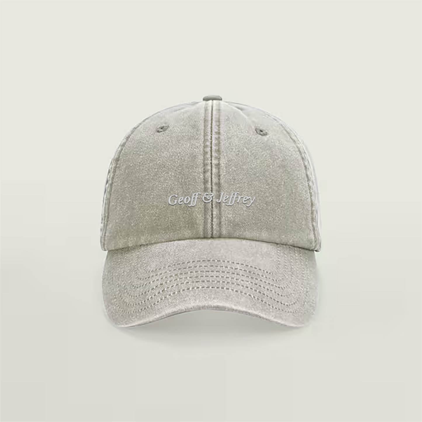 Front view of Geoff & Jeffrey vintage sand dad cap with white embroidery