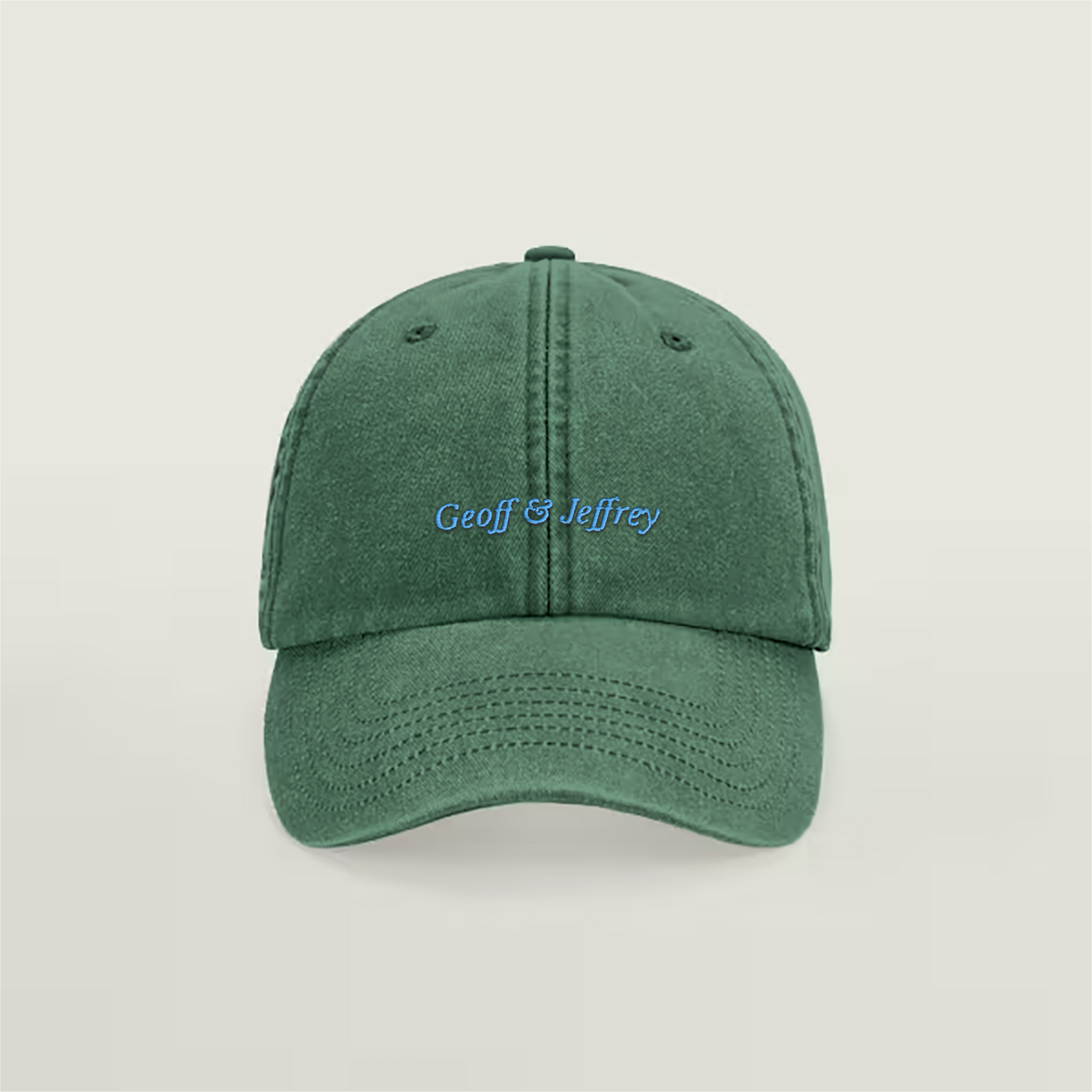 Front view of Geoff & Jeffrey vintage bottle green dad cap with blue embroidery