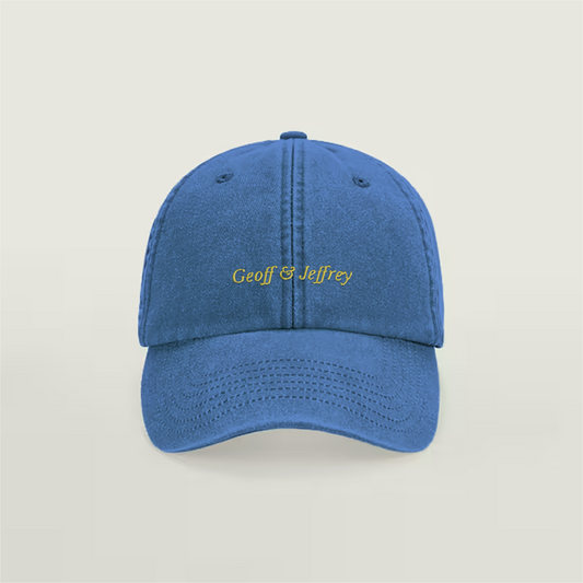 Front view of Geoff & Jeffrey vintage Cornflower blue dad cap with yellow embroidery