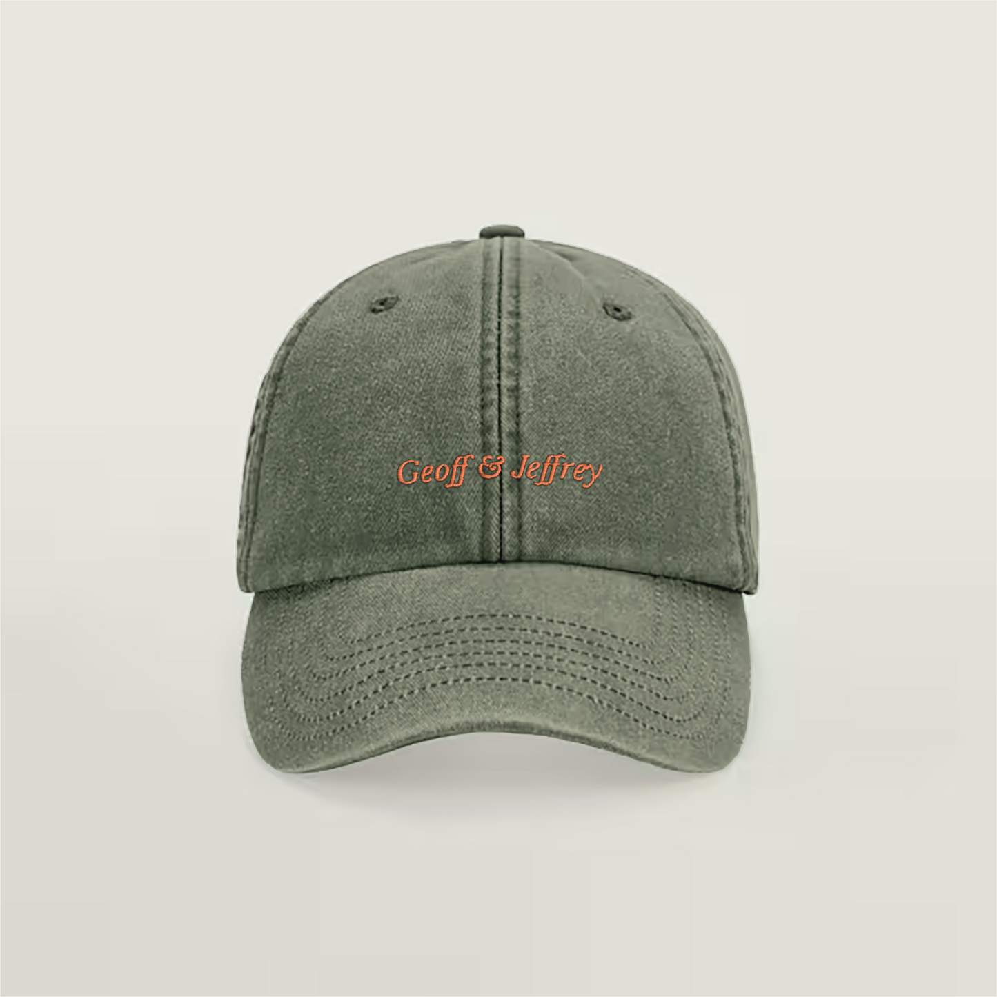 Front view of Geoff & Jeffrey vintage Olive Green dad cap with orange embroidery