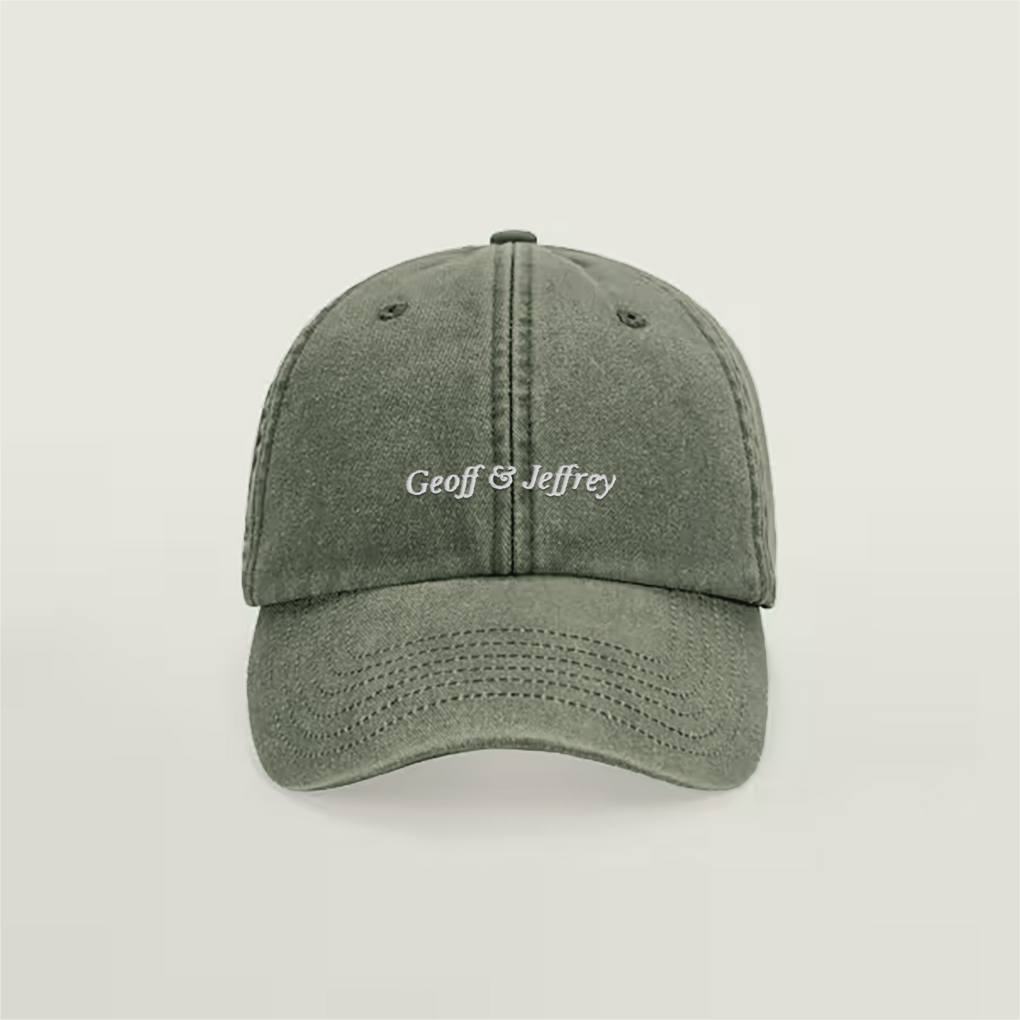 Front view of Geoff & Jeffrey vintage Olive Green dad cap with white embroidery