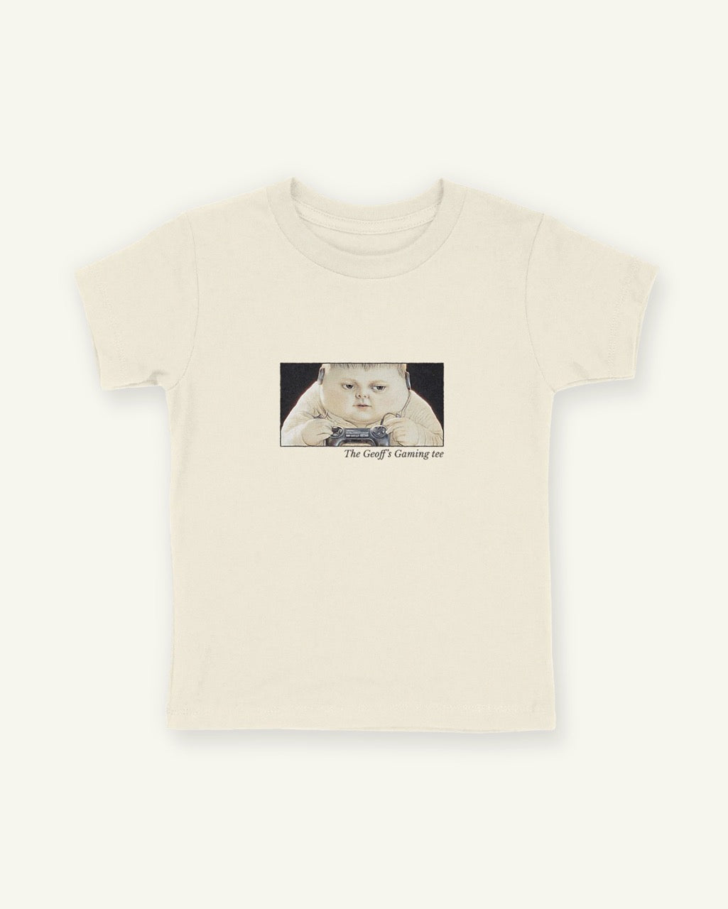 Natural white fitted children's tee with a framed front print of the boy Geoff gaming with the title below in Libre Baskerville.