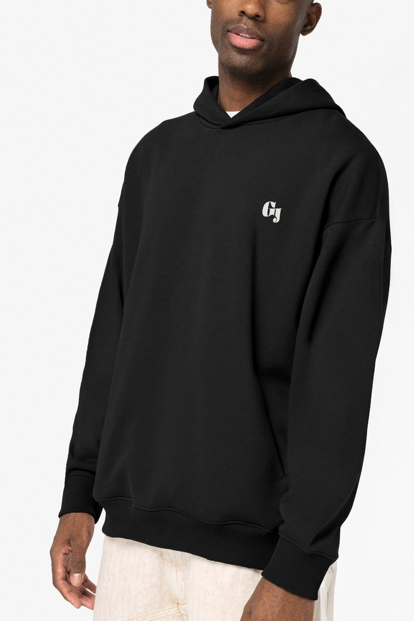 Person wearing a black hoodie with 'Geoff & Jeffrey' logo on the front