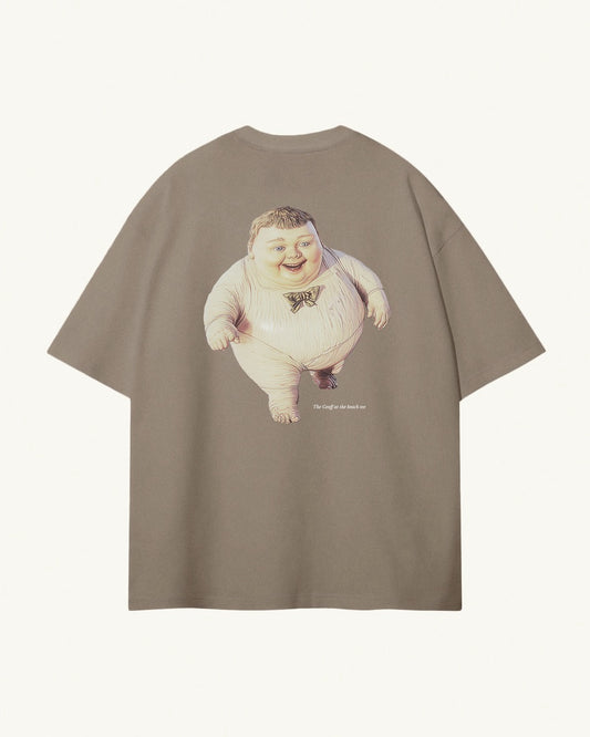 Back of light kaki / brown organic cotton Geoff & Jeffrey unisex t-shirt with drop shoulders and a large graphic backprint of the chubby boy Geoff running on the beach, with the title printed below in elegant font Libre Baskerville. The shirt has a cool aesthetic.