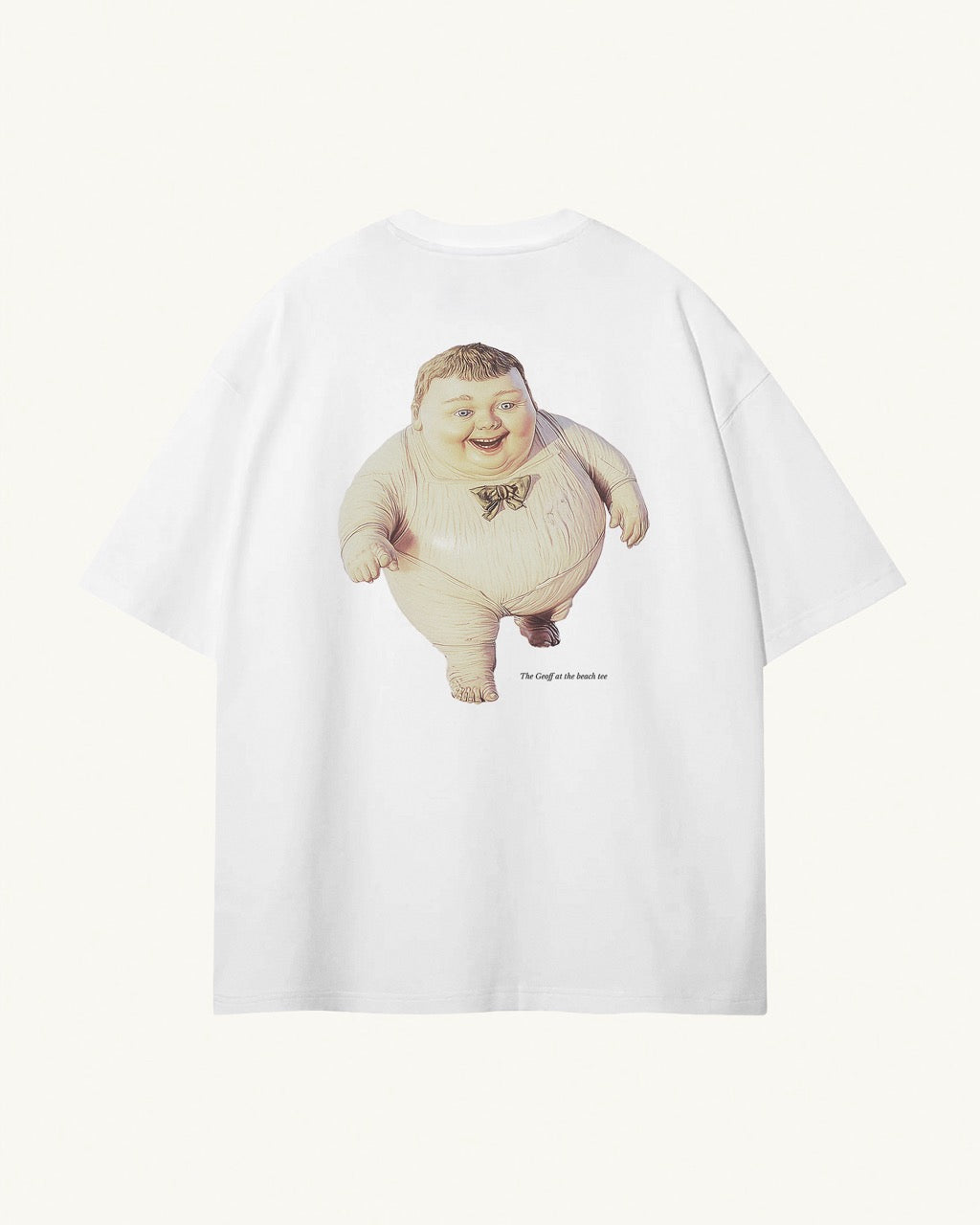 Back of white organic cotton Geoff & Jeffrey unisex t-shirt with drop shoulders and a large graphic backprint of the chubby boy Geoff running on the beach, with the title printed below in elegant font Libre Baskerville. The shirt has a cool aesthetic.