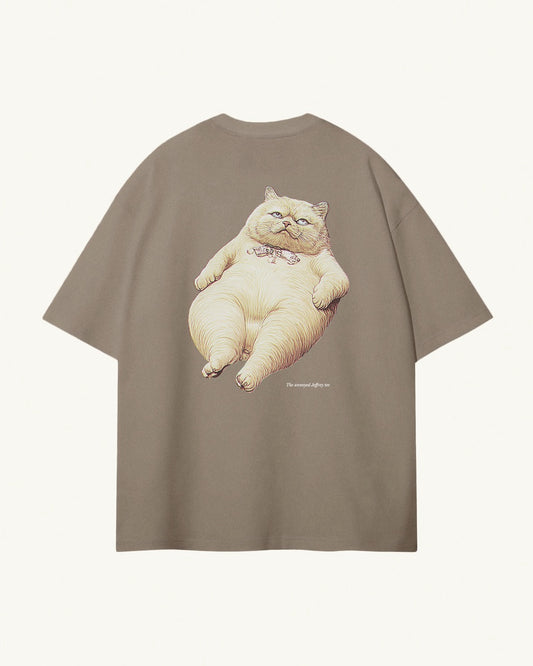 Back of light kaki / brown organic cotton Geoff & Jeffrey unisex t-shirt with drop shoulders and a large graphic backprint of a funny fat cat (Jeffrey) looking annoyed, and the title printed below. The shirt has a cool aesthetic.