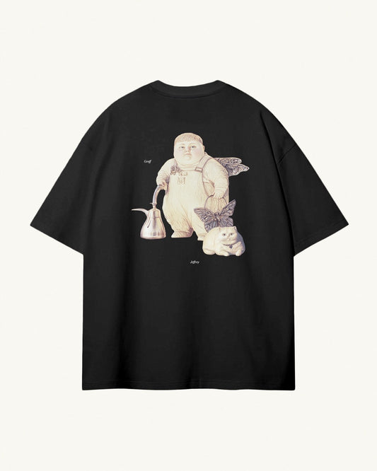 black organic cotton Geoff & Jeffrey unisex t-shirt with drop shoulders and a large graphic backprint of the weird duo, with their names printed aside in elegant font Libre Baskerville. The shirt has a cool aesthetic.