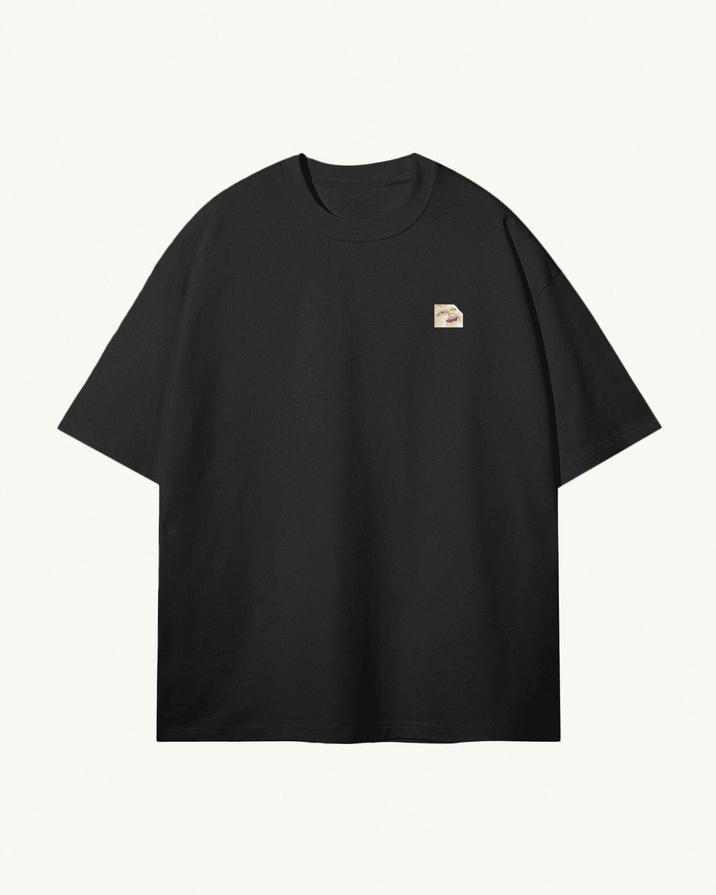 black organic cotton Geoff & Jeffrey unisex t-shirt with drop shoulders. The front of the shirt has a small close up of Geoff’s face and a minimal design.