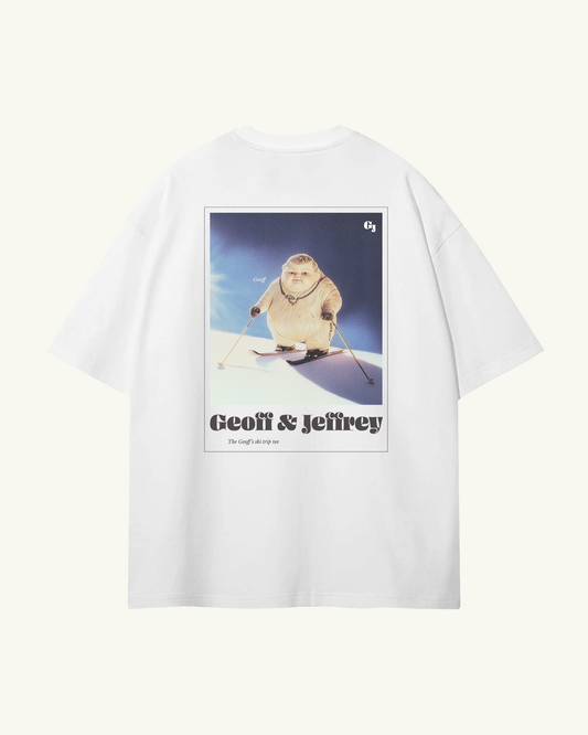 White t-shirt with a graphic of a funny boy on skis and text 'Geoff & Jeffrey' on a white background