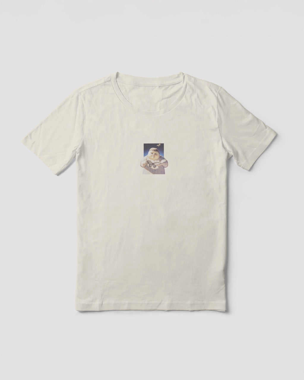 Women's off-white natural organic cotton Geoff & Jeffrey t-shirt with a small graphic print of a jolly, proud boy (Geoff) holding a butterfly in front of him. The t-shirt has a cute aesthetic.