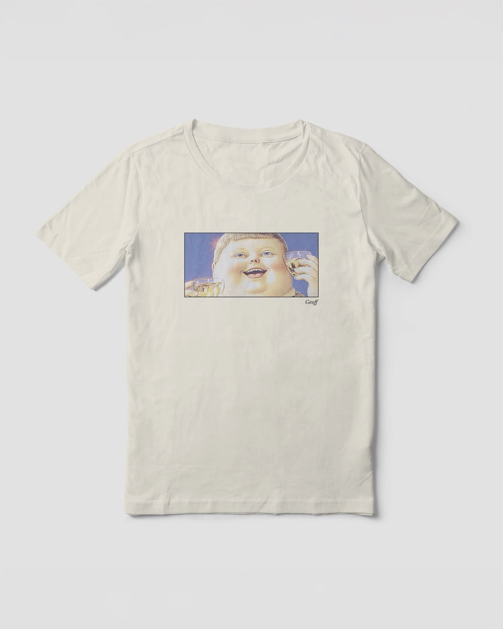 Women's off-white natural organic cotton Geoff & Jeffrey t-shirt with a framed graphic print of a jolly, proud boy (Geoff) looking upwards holding drinks for apero, with his name 'Geoff' subtly printed in Libre Baskerville below the image. The t-shirt has a feel good aesthetic.