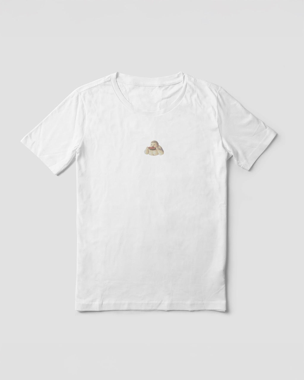 Women's white organic cotton Geoff & Jeffrey t-shirt with a graphic print of a jolly, proud boy (Geoff) smiling and eating a watermelon, with his name 'Geoff' subtly printed in Libre Baskerville below the image. The t-shirt has a cute aesthetic