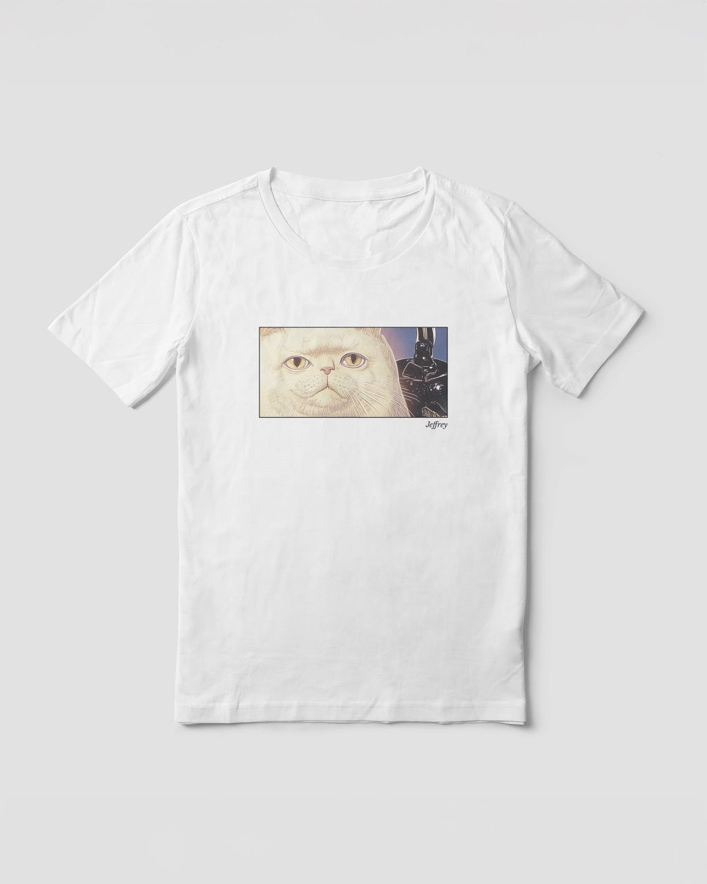 Women's white organic cotton Geoff & Jeffrey t-shirt with a framed graphic print of a funny fat cat (Jeffrey) poker-faced and a kettle at his side. With his name 'Jeffrey' subtly printed in Libre Baskerville below the image. The t-shirt has a cute aesthetic