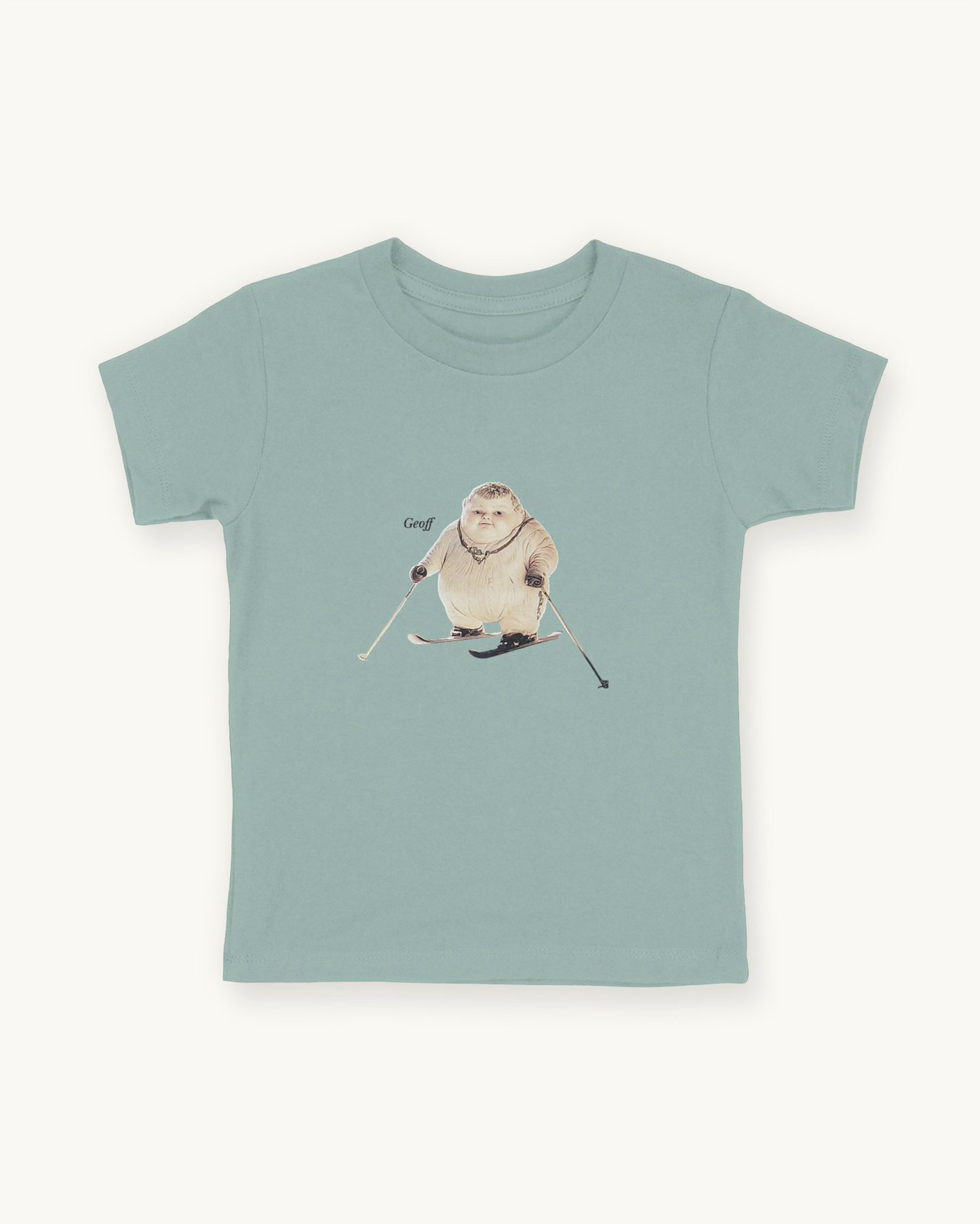 green organic cotton Geoff & Jeffrey children’s t-shirt. The front of the shirt has a print of Geoff with skis